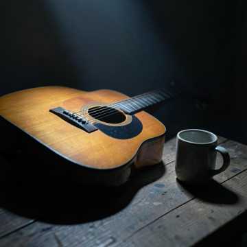 An emotional acoustic ballad with warm guitars and cover